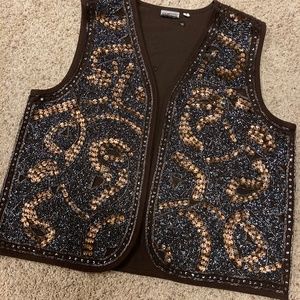 Chico's Sparkle Vest, size 2, lined..Open front, very heavy garment.